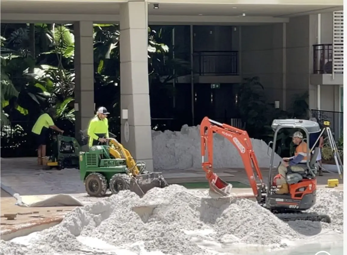 Mini excavator and loader working at a Cairns resort